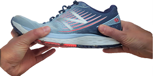 Test the support through the midsole by grabbing either ends of the shoe and twisting or bending the shoe.