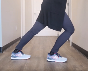 Calf stretch against the wall to help prevent plantar fasciitis